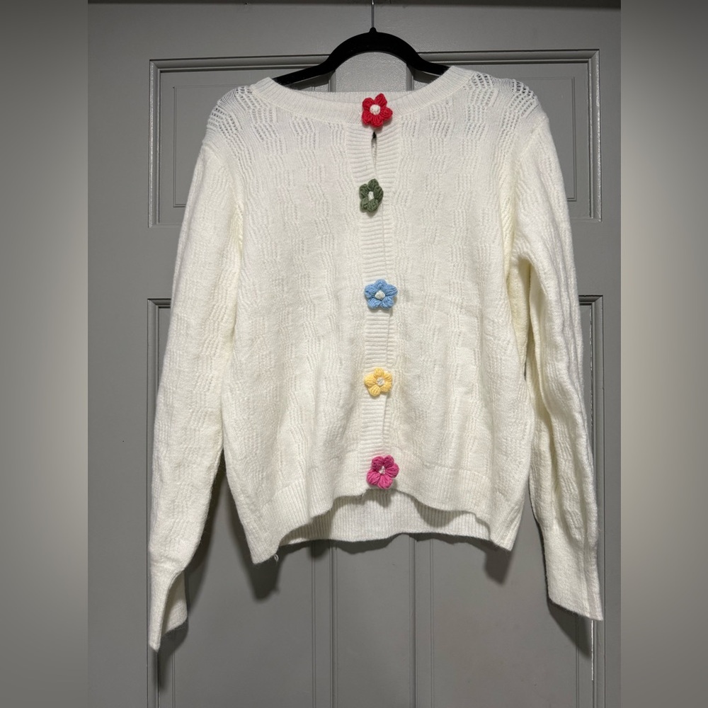 White and Red Cardigan with Playful Floral Accents